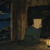墨を重ねる堂の黒い板